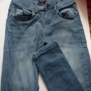 A Zara pair of light wash skinny jeans